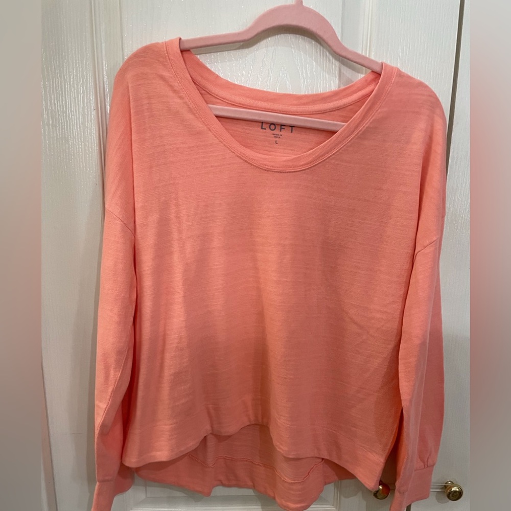 Peach colored lightweight knit top with full sleeve